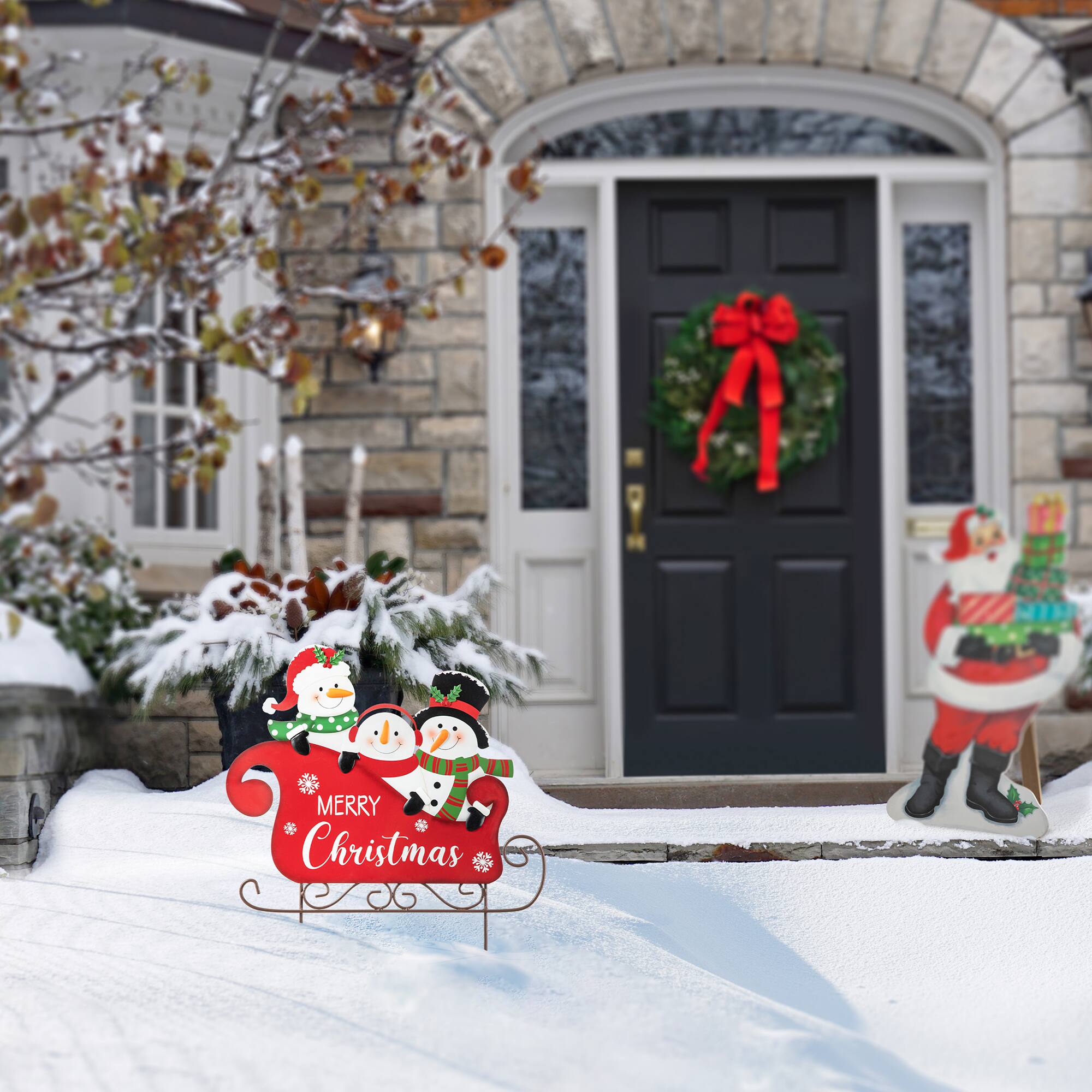Glitzhome® 24" Metal Snowmen Riding Sleigh Yard Stake